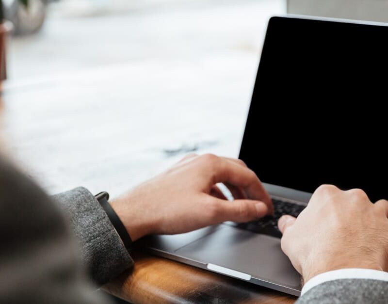 person using laptop